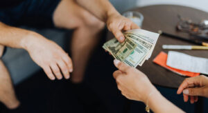 Exchanging cash between hands