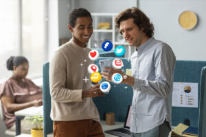 Two men sharing mobile app insights