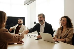 Professional meeting handshake exchange